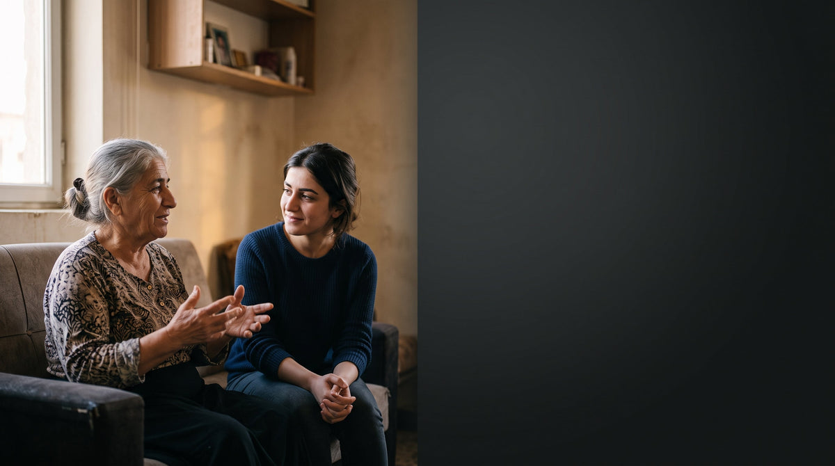 Two women talking together in a living room